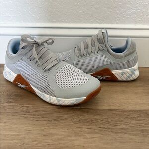 Reebok Women's Light Gray & Blue Mesh Training Shoes with Blue Accents